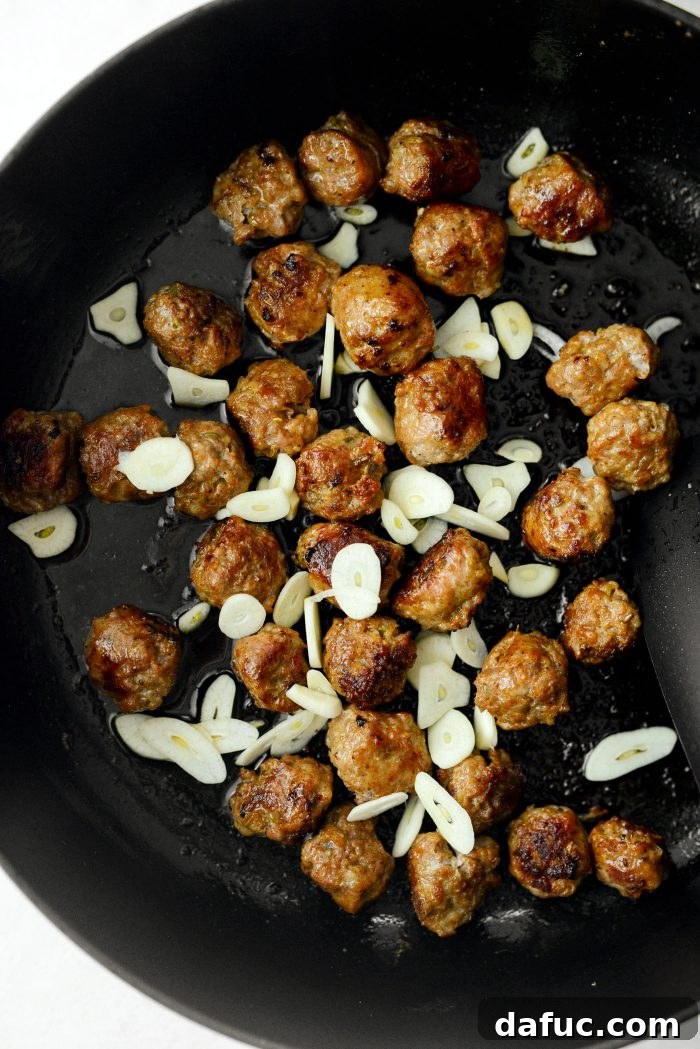 once cooked add in sliced garlic, stir and cook