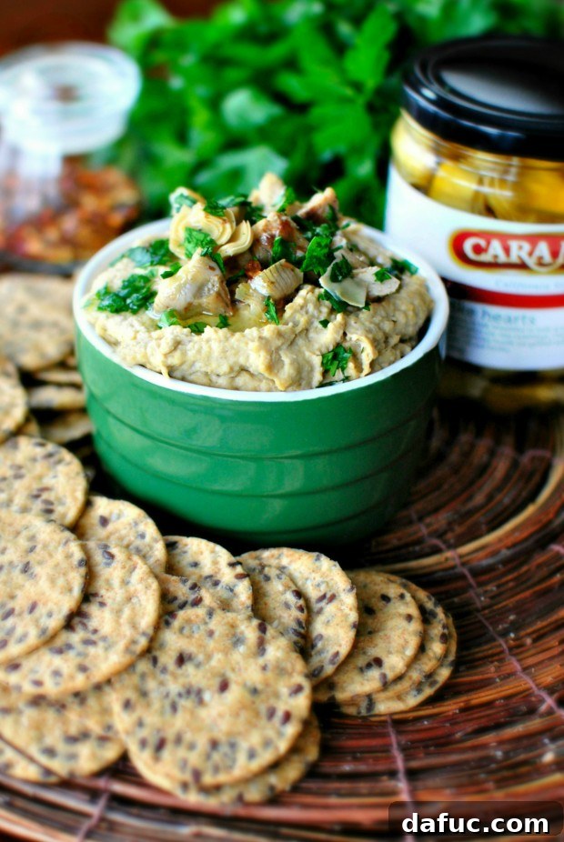 Garnished Grilled Artichoke Hummus ready to serve