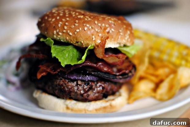 burger The Black and Bleu Burger, a close-up shot of the finished burger.