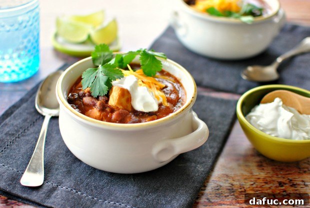 Chipotle Chicken Chili presented on a wooden board