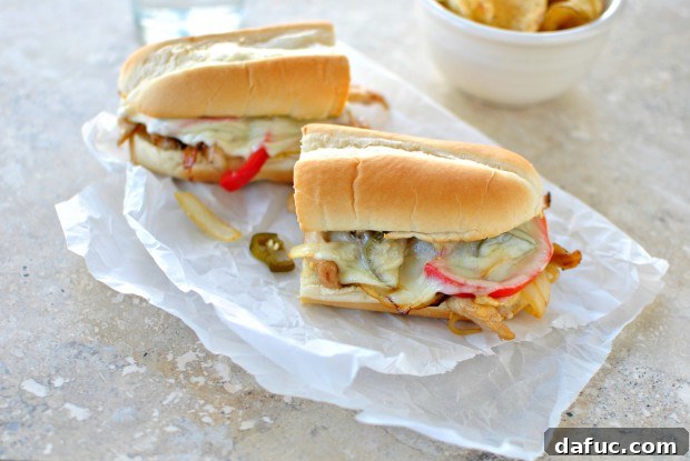 Melted Chicken Cheesesteak Perfection 2 Classic Chicken Cheesesteak Sandwiches with Melted Provolone, Peppers, Onions, and Pickled Jalapenos