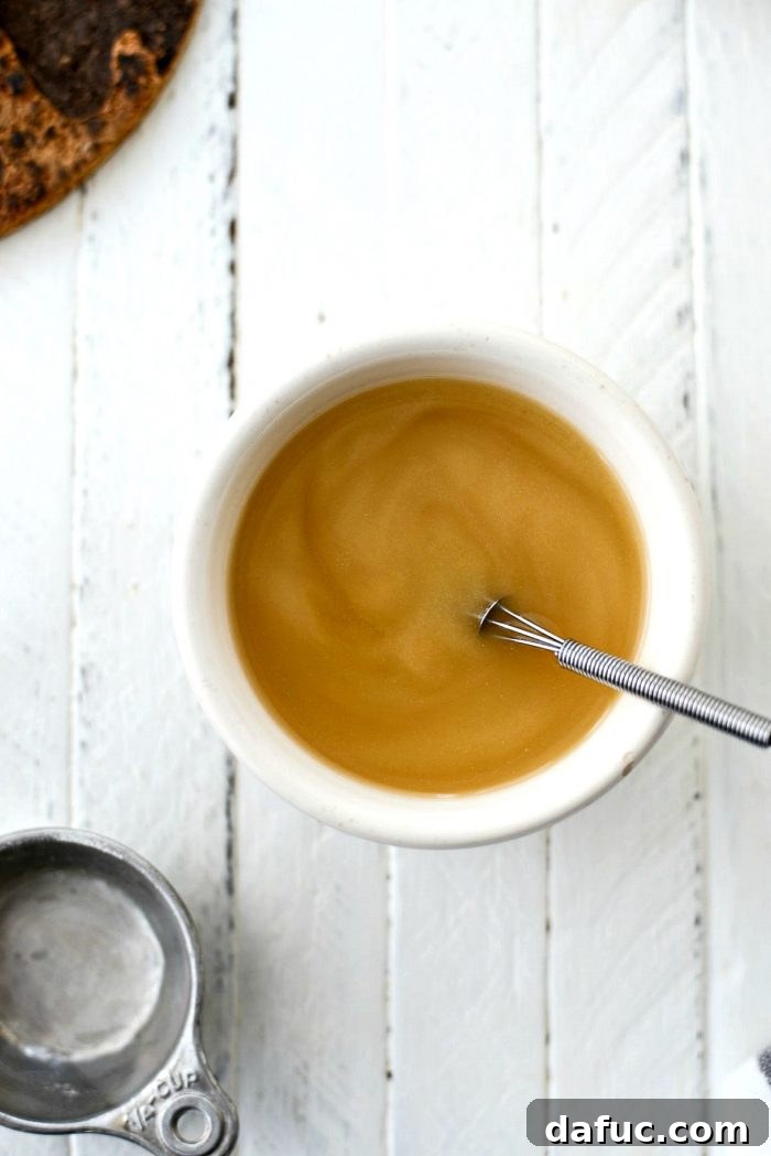 Whisking flour and turkey stock in a small bowl to create a thickening slurry for the soup. Keywords: homemade, turkey, potpie, soup, leftover, fromscratch, thanksgiving, leftovers