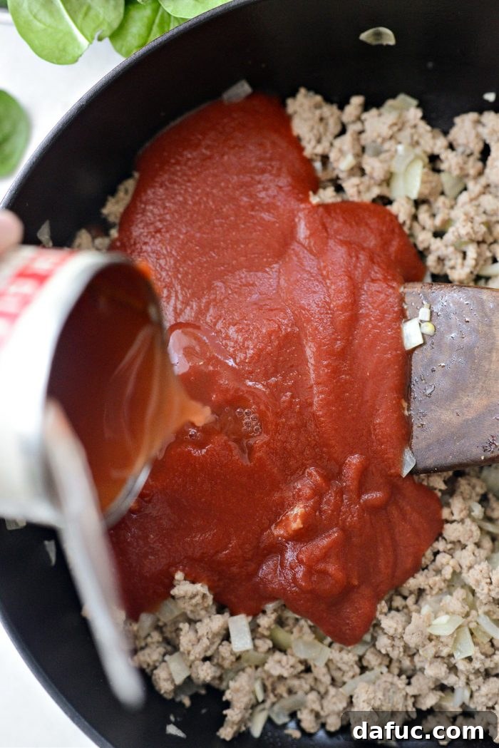 add tomato sauce and 1/2 can pasta water