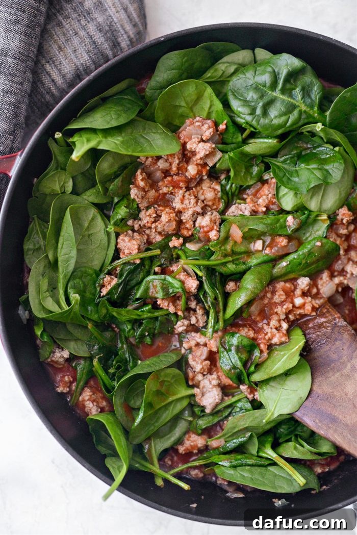 stir to finish wilting the spinach