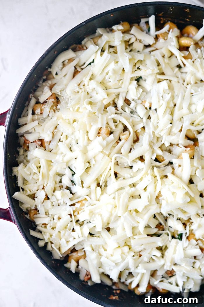 add shredded three cheeses