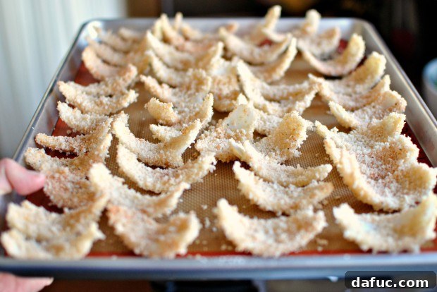 Golden Baked Onion Blooms with Zesty Fry Dip 12 Baked onion petals on a sheet pan