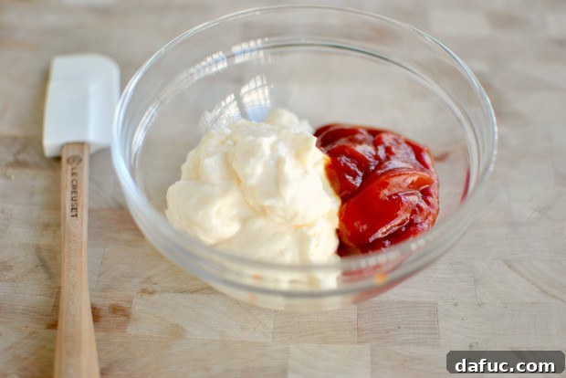 Golden Baked Onion Blooms with Zesty Fry Dip 13 Ketchup and mayonnaise for fry sauce