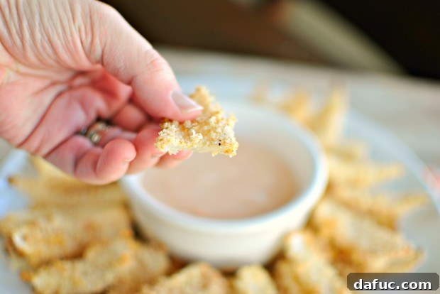 Golden Baked Onion Blooms with Zesty Fry Dip 19 Taking a bite of the onion petal