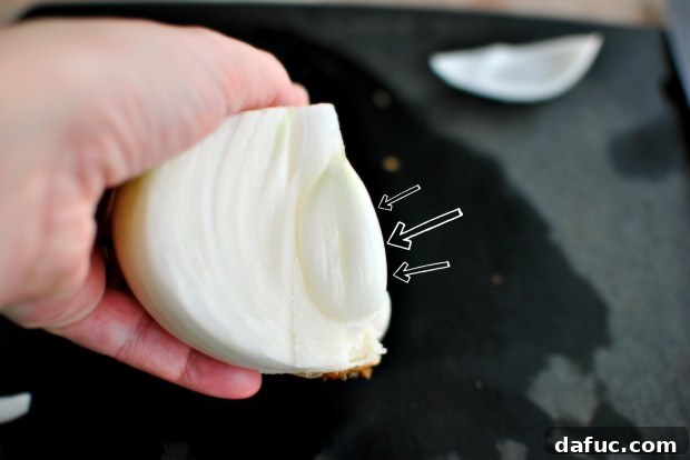 Golden Baked Onion Blooms with Zesty Fry Dip 5 Removing and discarding the onion core