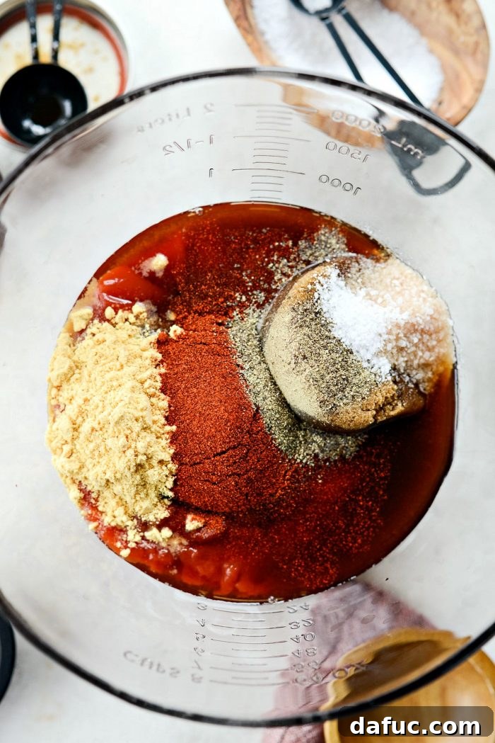 Adding dark brown sugar to a bowl with wet ingredients for homemade barbecue sauce, preparing for mixing.