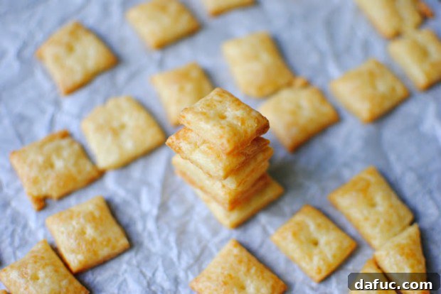 Stacked homemade White Cheddar Parmesan Cheez-It crackers, ready for snacking