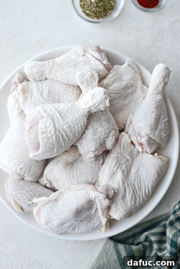 Classic Comfort Baked Chicken 11 Coated chicken pieces on a clean plate