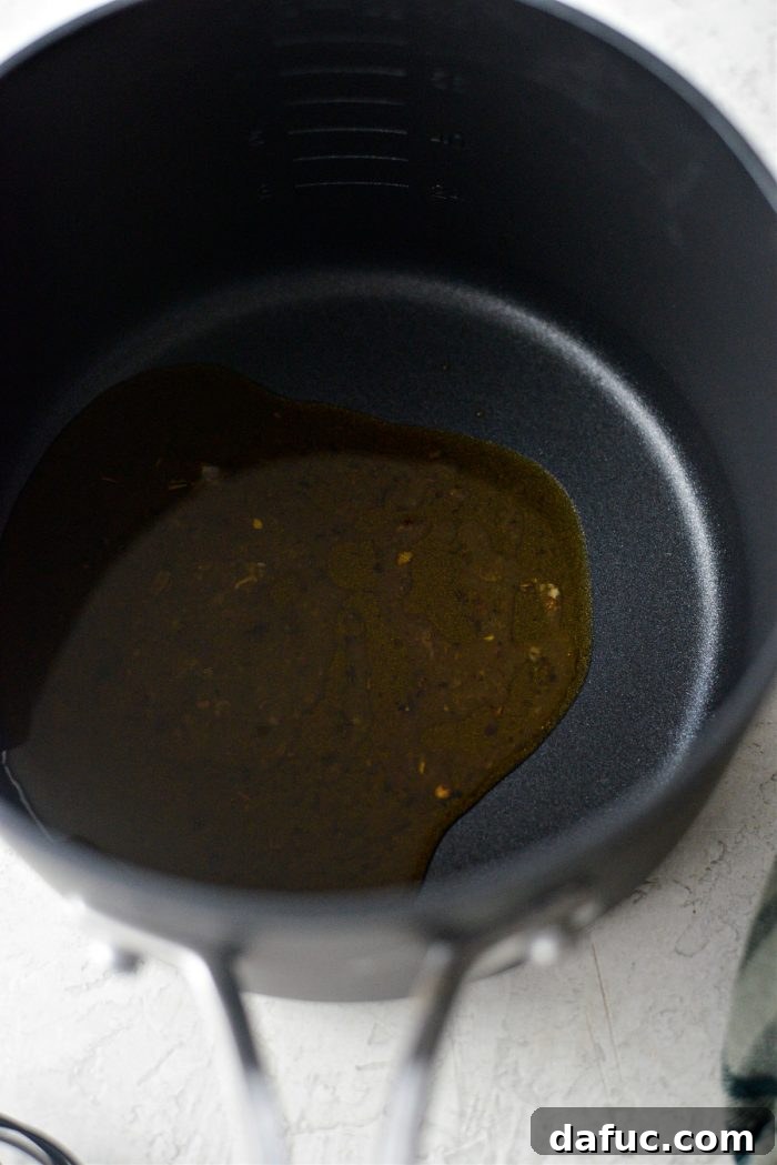 Classic Comfort Baked Chicken 20 Two tablespoons of pan drippings in a saucepan