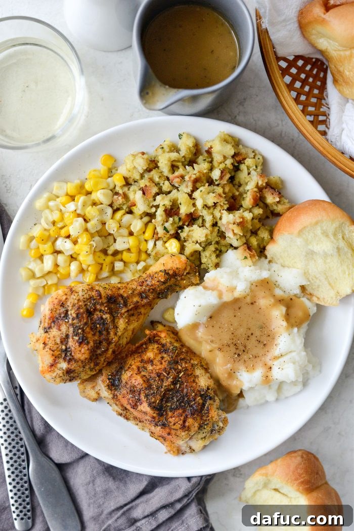 Classic Comfort Baked Chicken 25 A close-up of Homestyle Baked Chicken with gravy drizzled over it
