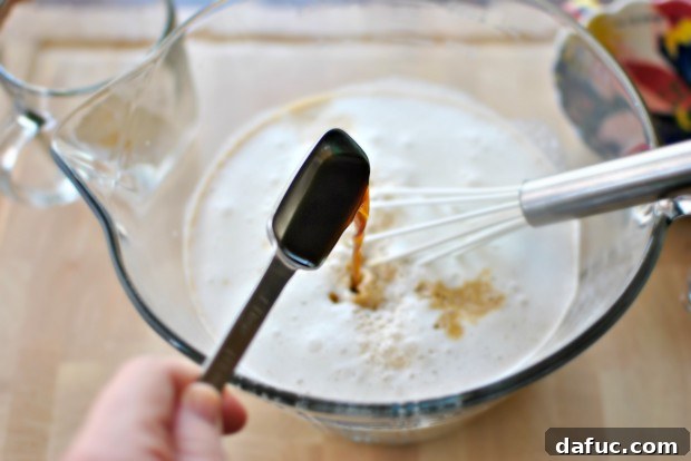 Adding pure vanilla extract to coffee ice cream base