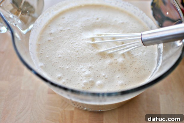 Whisking all ingredients to combine thoroughly
