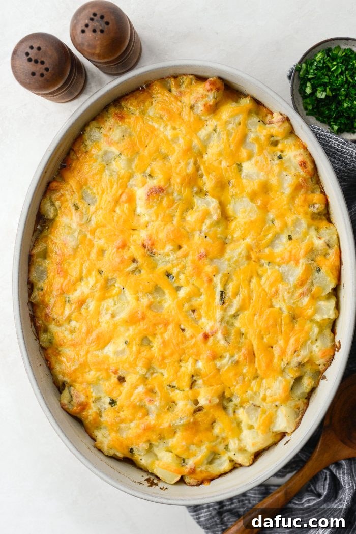 Close-up of the crispy, golden-brown edges of homemade cheesy potatoes
