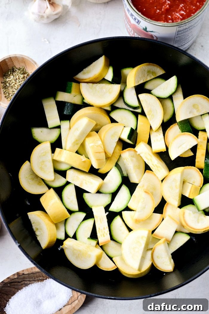 Rustic Garden Ragu 7 Yellow squash and zucchini added to a hot skillet in an even layer