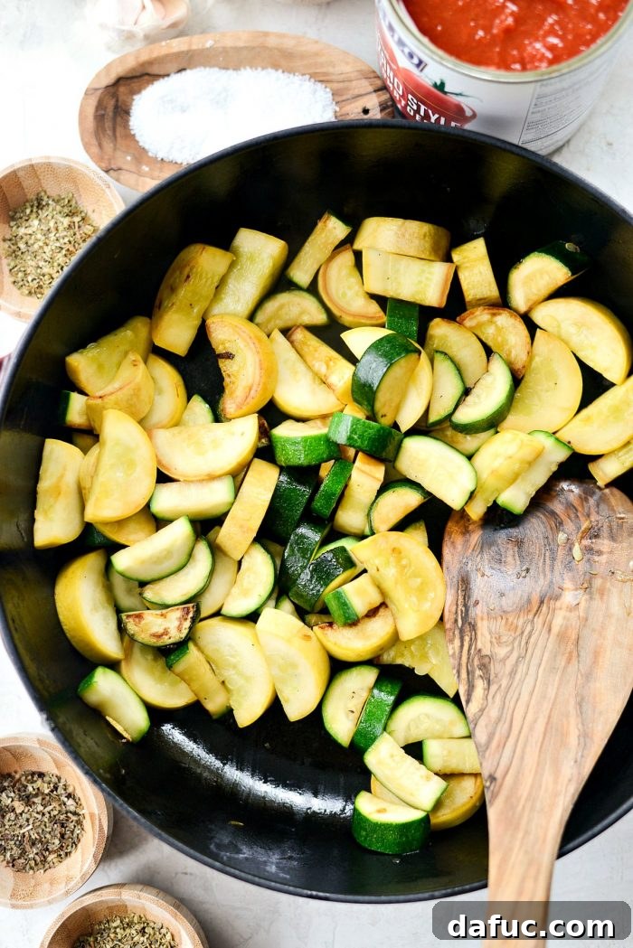 Rustic Garden Ragu 8 Yellow squash and zucchini browning in a skillet