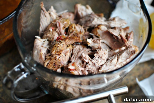 Smoky Sweet Slow Cooker Chipotle Honey Pulled Pork 2 Tender Slow Cooker Chipotle Honey Pulled Pork, shredded perfectly for versatile meals