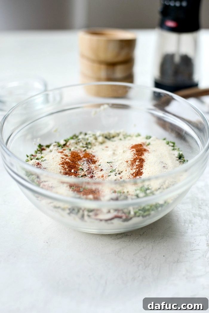 Craft Your Signature Ranch Blend 6 Adding dried herbs and spices to powdered buttermilk for homemade ranch mix.