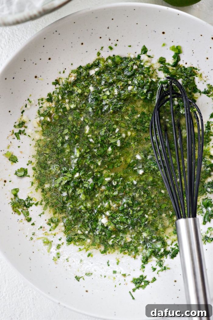 All marinade ingredients combined and whisked in a bowl