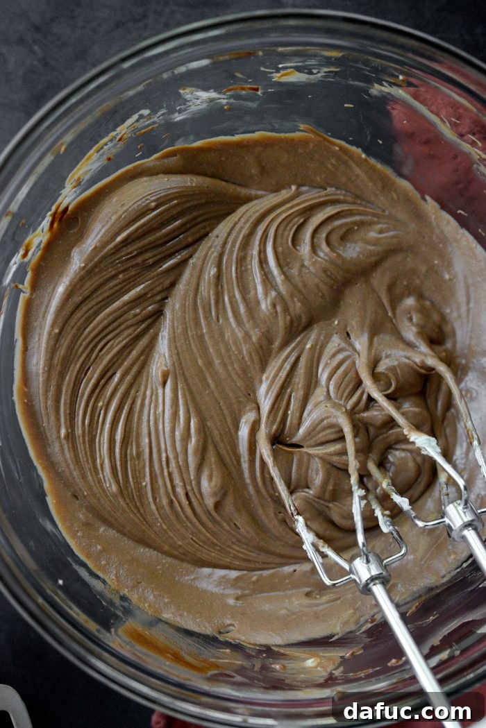 Nutella Ribbon Pumpkin Cheesecake Muffins 13 mix well to combine until smooth