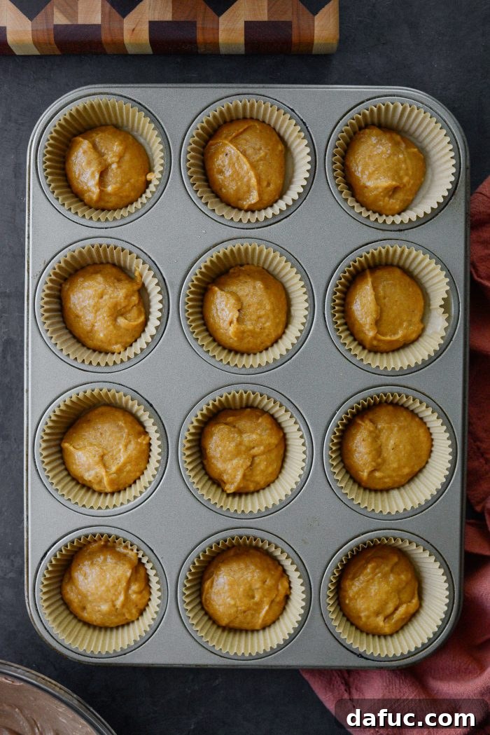 Nutella Ribbon Pumpkin Cheesecake Muffins 14 add 2T batter to lined muffin pan