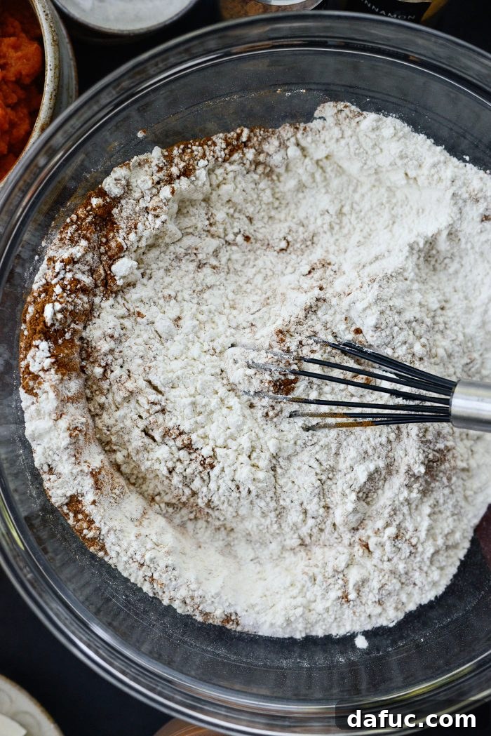 Nutella Ribbon Pumpkin Cheesecake Muffins 6 combine dry ingredients in bowl