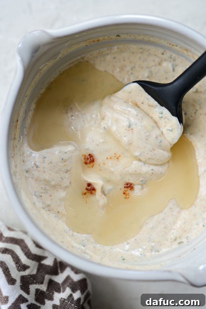 Adding bacon fat and lemon juice to dressing