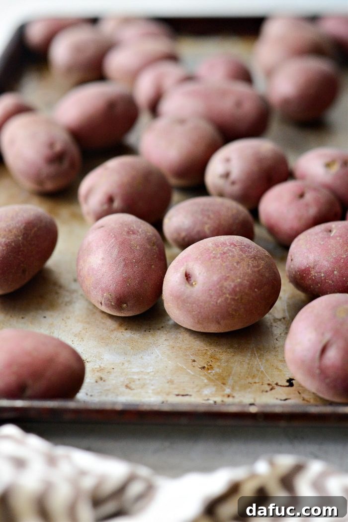Baby redskin potatoes on a baking sheet