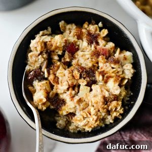 Warm Apple Cinnamon Oat Bake 16 Apple Cinnamon Baked Oatmeal in a square dish, ready to be served
