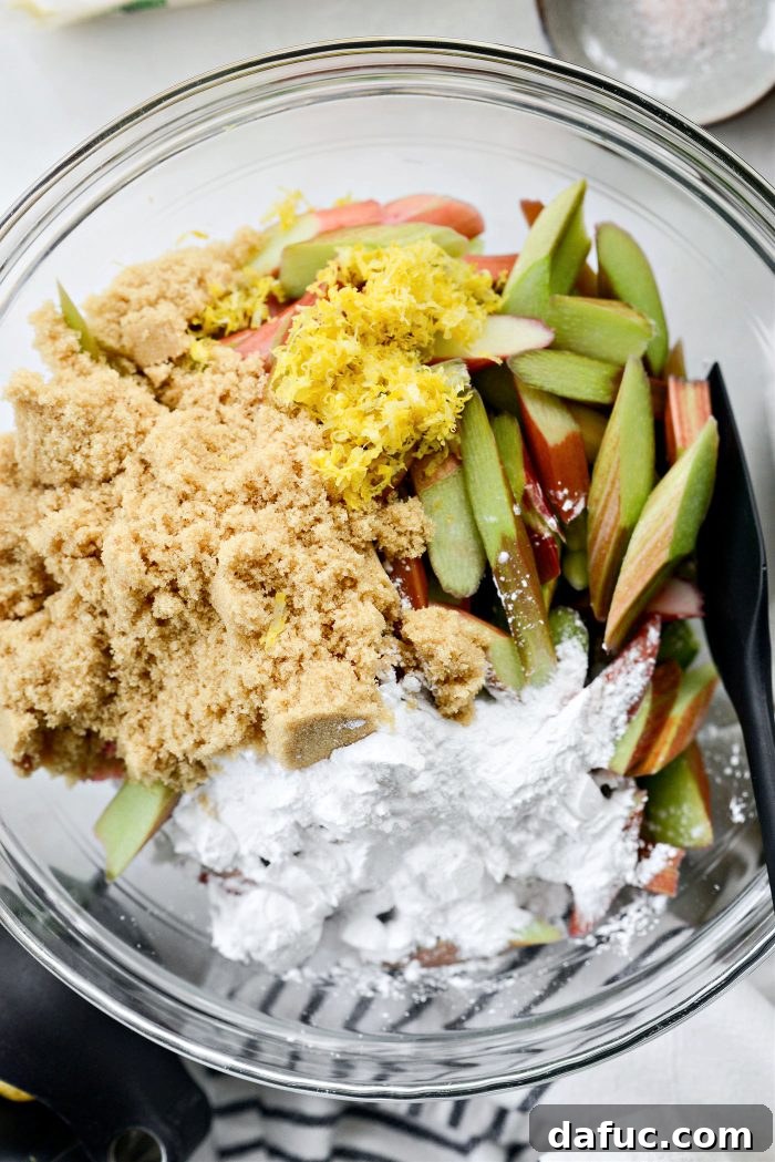 Golden Baked Rhubarb Crumble 6 rhubarb, brown sugar, cornstarch and lemon zest in a bowl