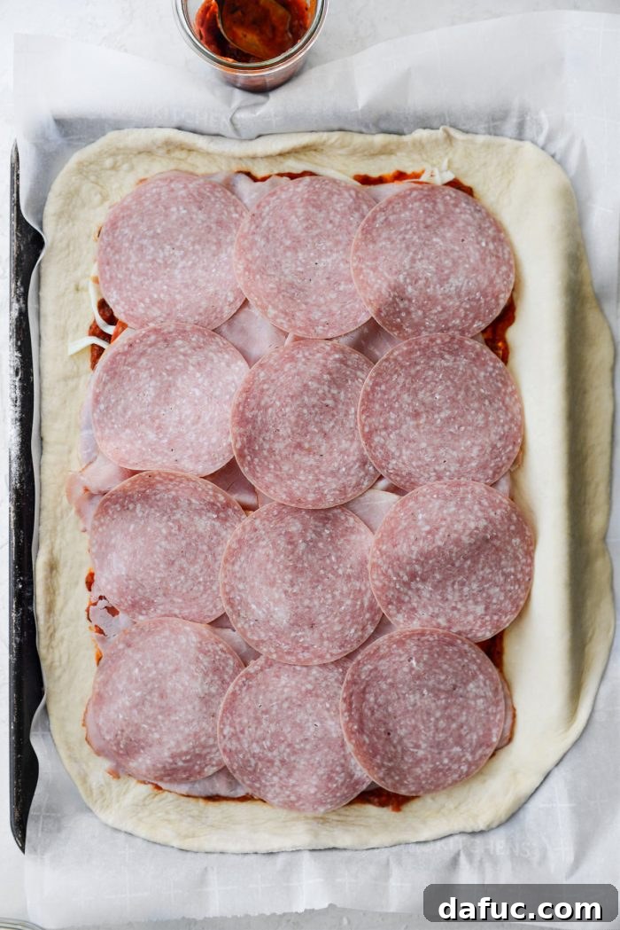 From Scratch Stromboli 13 arrange genoa salami over ham