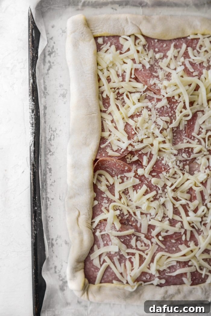 From Scratch Stromboli 18 fold the long side opposite of the 2-inch overhang