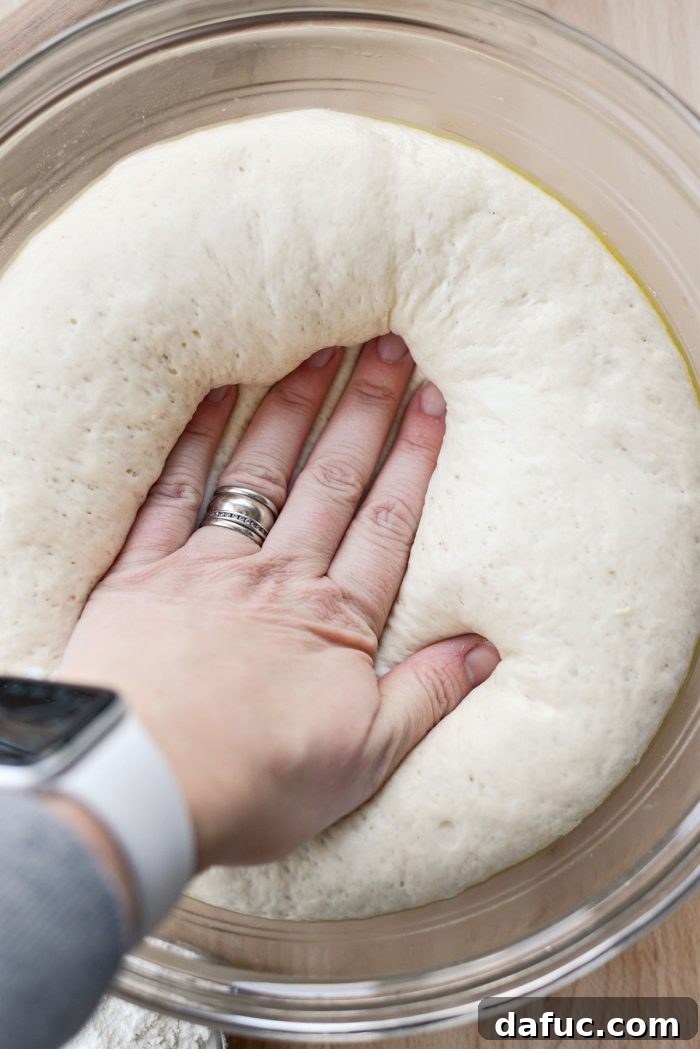 From Scratch Stromboli 5 press on pizza dough to deflate
