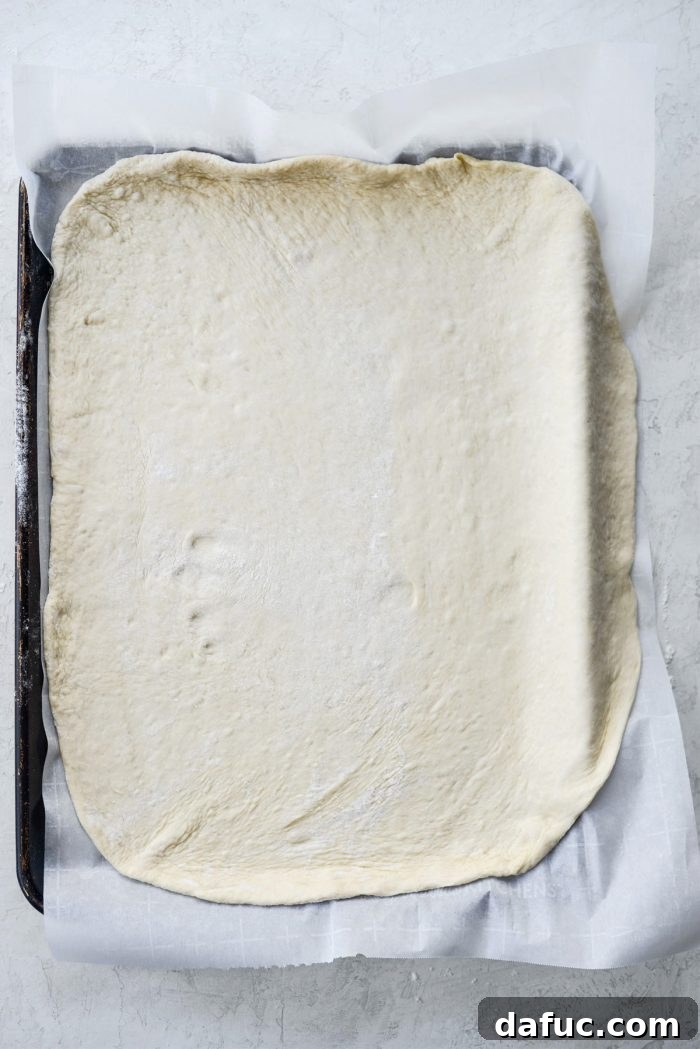 From Scratch Stromboli 8 transfer dough to parchment lined pan
