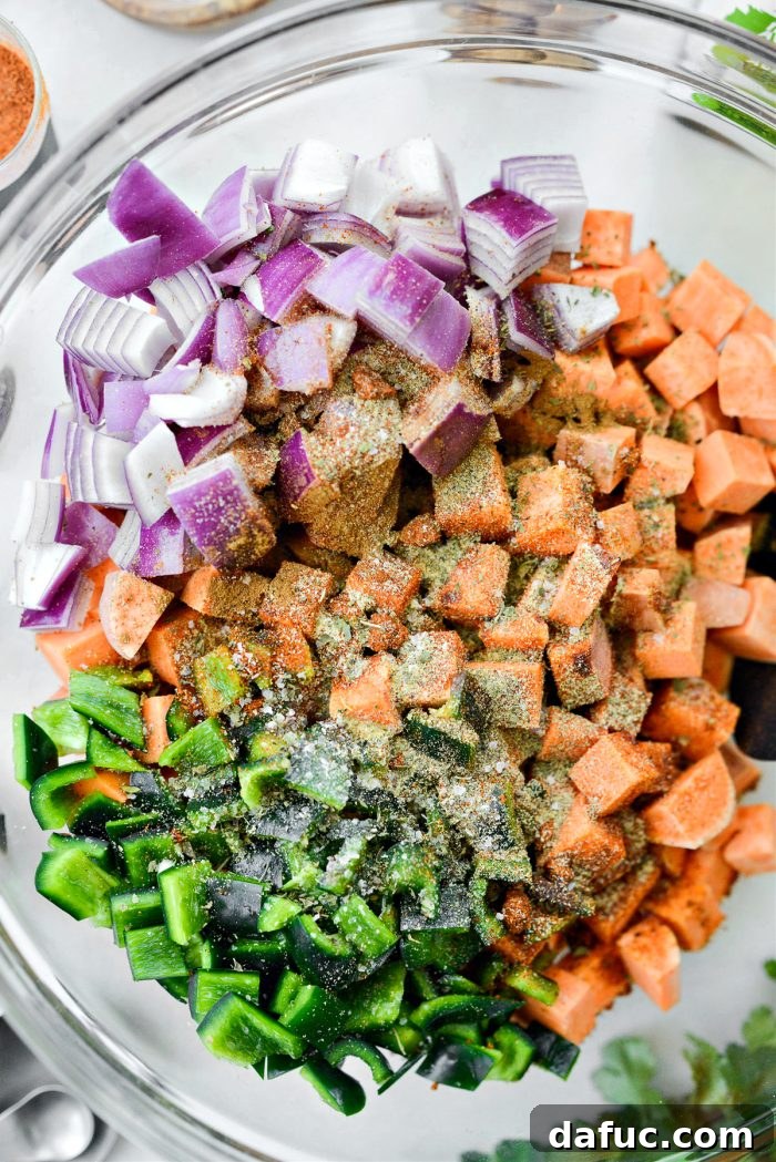 Add spices and seasonings to the sweet potato mixture.