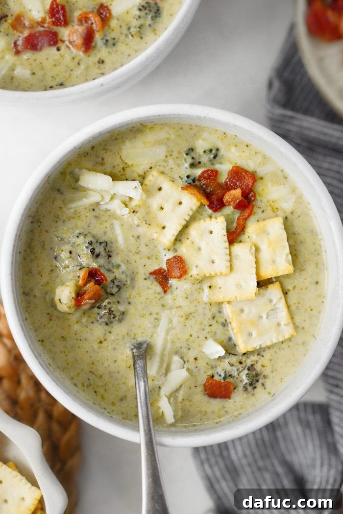 Full spread of Roasted Broccoli Cauliflower Soup with bread