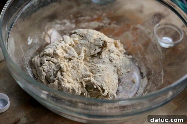 Pillowy Naan Perfection at Home 17 Naan dough just come together into a shaggy mass, ready for kneading.