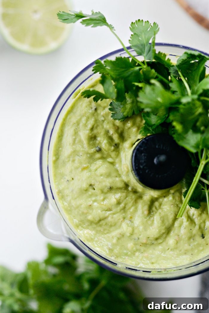 Zesty Tomatillo Avocado Salsa 11 Blending Tomatillo Avocado Salsa until combined.
