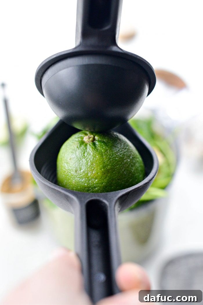 Zesty Tomatillo Avocado Salsa 13 Adding lime juice as the final ingredient to the salsa.