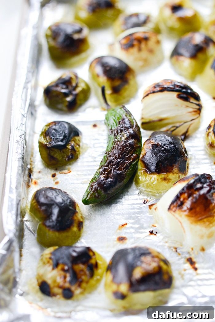 Zesty Tomatillo Avocado Salsa 7 Broiled tomatillos, onion, and jalapeño with visible charring.