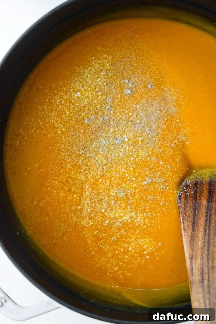 Vibrant Sweet Potato Tomatillo Bisque 16 Seasoning the sweet potato tomatillo bisque with salt and pepper