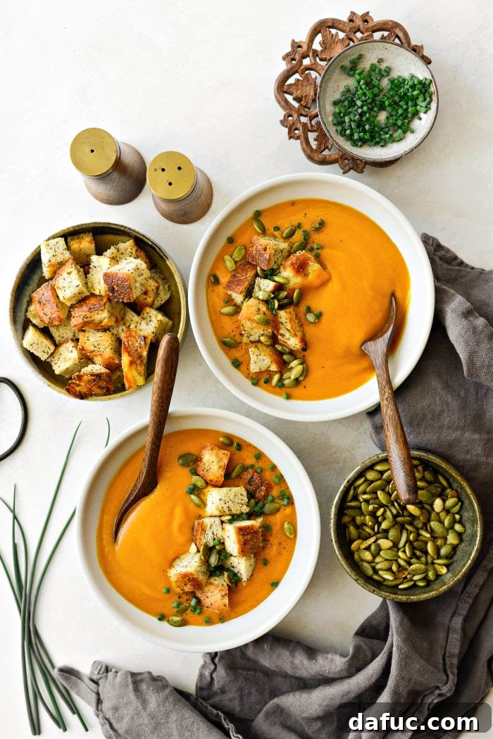 Vibrant Sweet Potato Tomatillo Bisque 18 Sweet Potato Tomatillo Bisque in a bowl, garnished