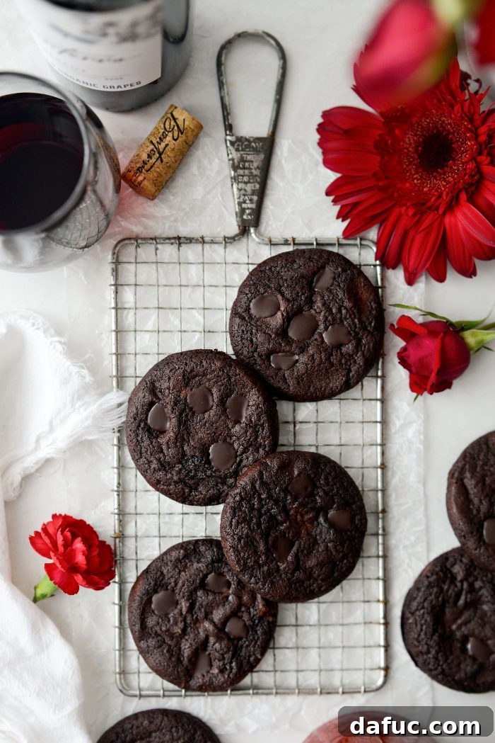 Decadent Merlot-Infused Dark Chocolate Cookies 20 A stacked close-up of Double Dark Chocolate Merlot Cookies, showing their rich texture and fudgy centers.