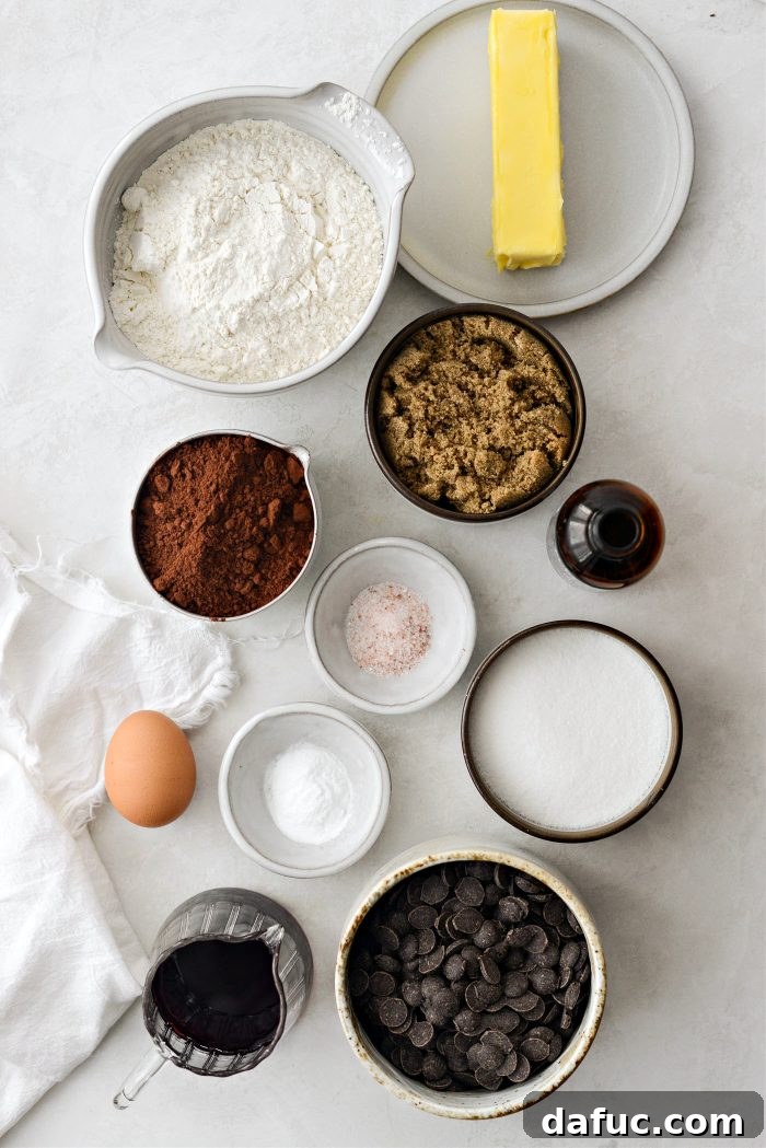 Decadent Merlot-Infused Dark Chocolate Cookies 4 All the essential ingredients for Double Dark Chocolate Merlot Cookies laid out neatly, ready for baking.