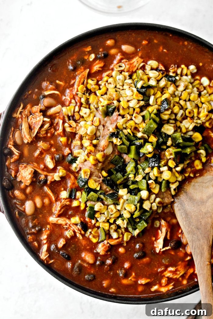 Smoky Southwest Chicken Chili 13 Adding beans, charred corn, and poblano pepper to the chili