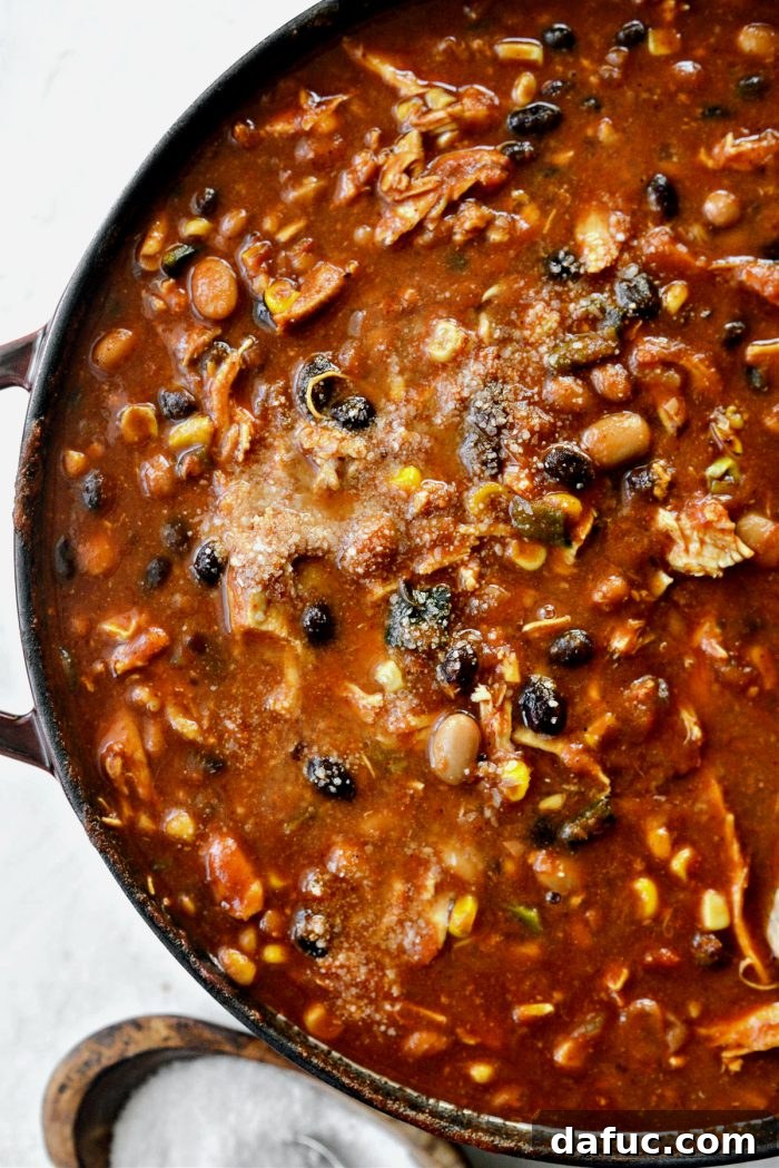 Smoky Southwest Chicken Chili 14 Seasoning the chili with salt to taste
