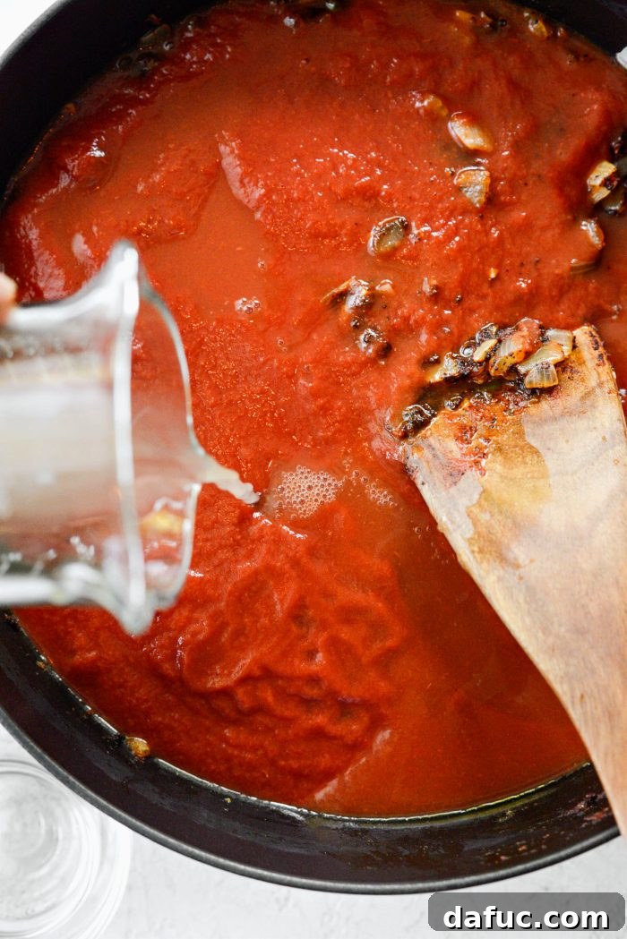 Smoky Southwest Chicken Chili 8 Nesting thin-cut chicken breasts into the chili sauce